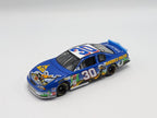Action 1:24 #30 AOL Daffy Duck Monte Carlo 400 Rematch 2002 NASCAR Diecast